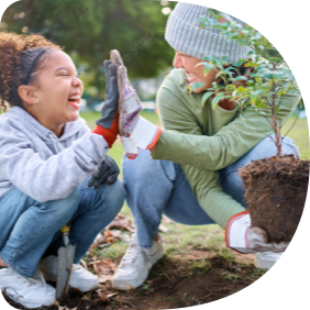 A woman and child gardening